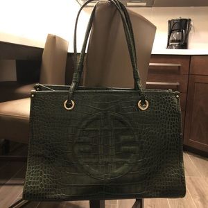Dark green Antonio Melani purse.